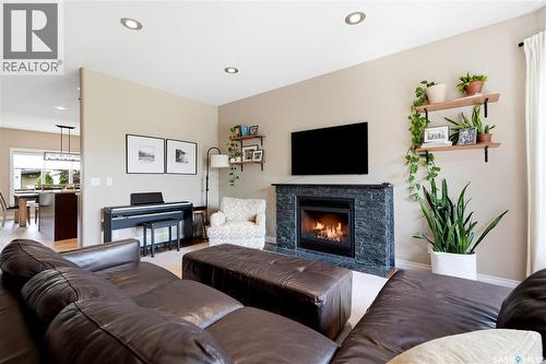 315 Werschner Lane, Saskatoon, SK - Indoor Photo Showing Living Room With Fireplace