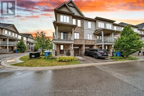 87 - 88 Decorso Drive, Guelph (Kortright East), ON - Outdoor With Balcony With Facade