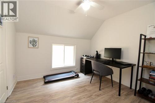 Bright room featuring wood-finish flooring, a white ceiling fan, and a window with natural light - 106 Belview Avenue, Hamilton, ON - Indoor Photo Showing Office