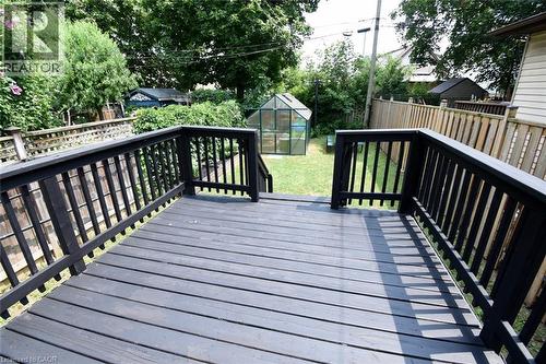 Spacious outdoor deck with dark wood-finish flooring and black railing - 106 Belview Avenue, Hamilton, ON - Outdoor With Deck Patio Veranda With Exterior