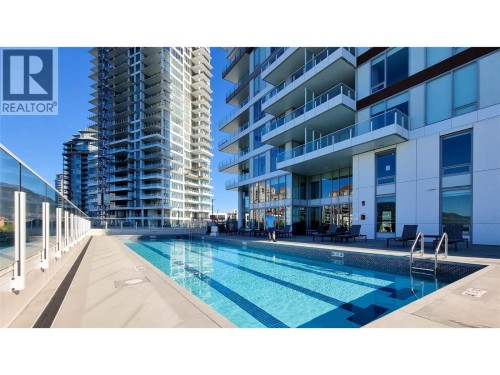 Adult Pool - 1191 Sunset Drive Unit# 609, Kelowna, BC - Outdoor With In Ground Pool With Facade