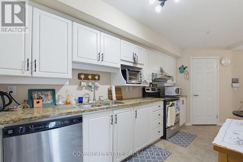 203 - 511 Gainsborough Road, London North (North F), ON - Indoor Photo Showing Kitchen With Double Sink
