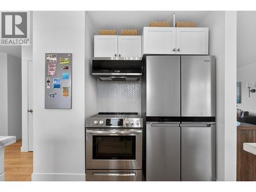 2490 Sexsmith Road, Kelowna, BC - Indoor Photo Showing Kitchen With Stainless Steel Kitchen