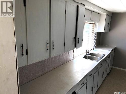 626 Main Street, Hudson Bay, SK - Indoor Photo Showing Kitchen With Double Sink
