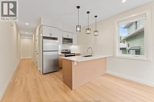 150 Old Front Unit# Main, Lasalle, ON - Indoor Photo Showing Kitchen With Stainless Steel Kitchen With Upgraded Kitchen