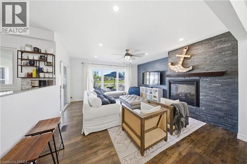 382 Cedar Drive, Turkey Point, ON - Indoor Photo Showing Living Room With Fireplace