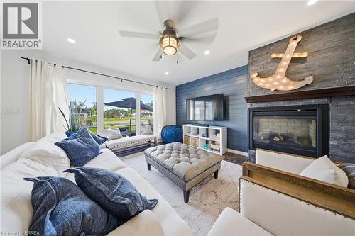 382 Cedar Drive, Turkey Point, ON - Indoor Photo Showing Living Room With Fireplace