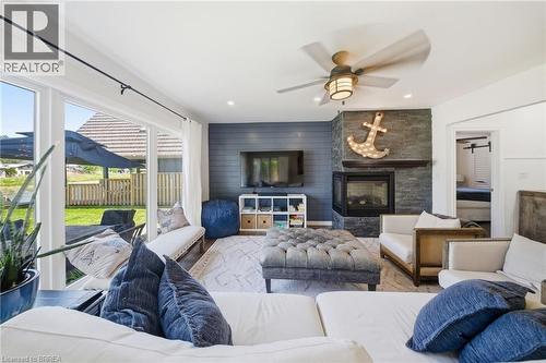 382 Cedar Drive, Turkey Point, ON - Indoor Photo Showing Living Room With Fireplace