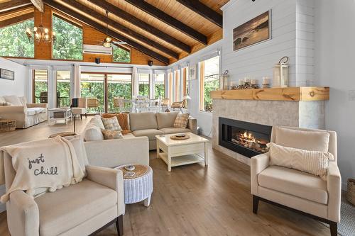 10215 Twin Bays Road, Twin Bays, BC - Indoor Photo Showing Living Room With Fireplace