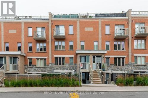 Th# 137 - 25 Turntable Crescent, Toronto, ON - Outdoor With Facade