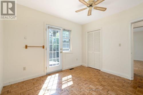 Main floor bedroom #1 with walk out to backyard - 52 Briarwood Avenue, Mississauga, ON - Indoor Photo Showing Other Room