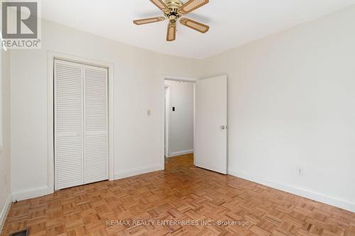 Main floor bedroom #1 with walk out to backyard - 52 Briarwood Avenue, Mississauga, ON - Indoor Photo Showing Other Room