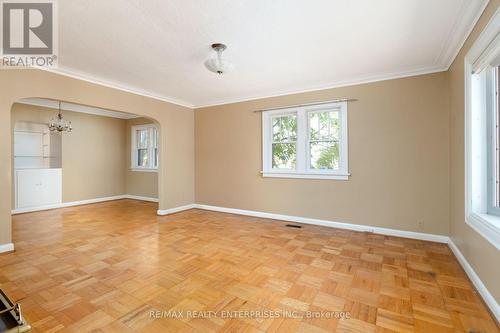 Main floor living room with wood burning fireplace - 52 Briarwood Avenue, Mississauga, ON - Indoor Photo Showing Other Room