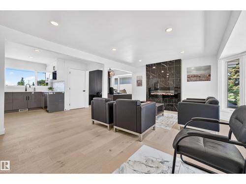 6011 93A Av Nw, Edmonton, AB - Indoor Photo Showing Living Room With Fireplace