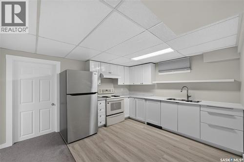 18 University Park Drive, Regina, SK - Indoor Photo Showing Kitchen With Double Sink