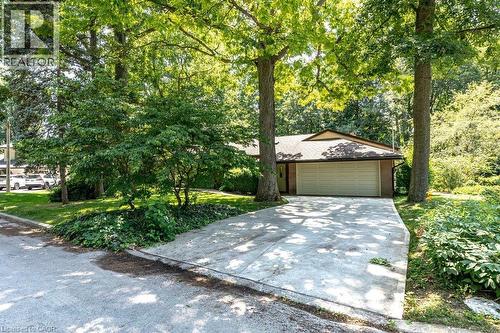 cement driveway leads to the double garage - 44 Colquhoun Crescent, Hamilton, ON - Outdoor