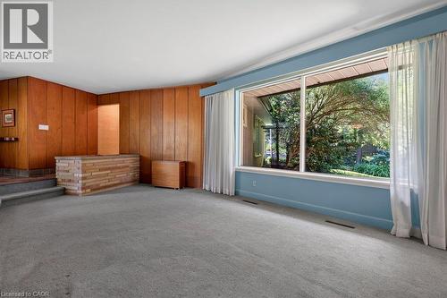 large picture window to enjoy the view of nature in the backyard - 44 Colquhoun Crescent, Hamilton, ON - Indoor Photo Showing Other Room
