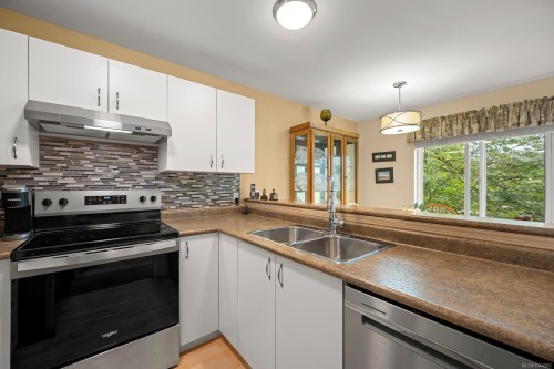 #203B-698 Aspen Rd, Comox, BC - Indoor Photo Showing Kitchen With Double Sink