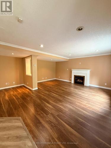 14 Hearthbridge Street, Kitchener, ON - Indoor Photo Showing Other Room With Fireplace
