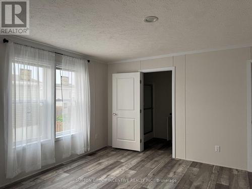 Bedroom 1 with ensuite - 182 Remi Crescent, Timmins, ON - Indoor Photo Showing Other Room