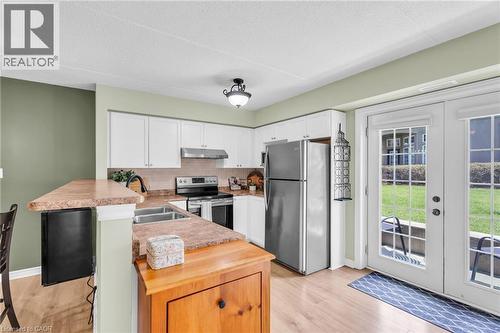 1479 Maple Avenue Unit# 102, Milton, ON - Indoor Photo Showing Kitchen With Double Sink