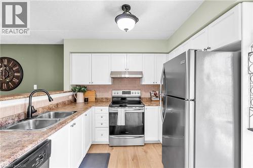 1479 Maple Avenue Unit# 102, Milton, ON - Indoor Photo Showing Kitchen With Double Sink