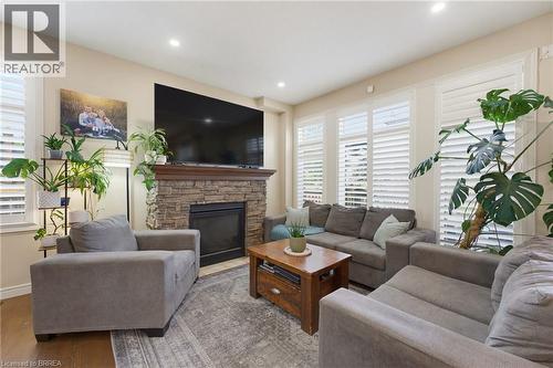 63A Clench Avenue, Brantford, ON - Indoor Photo Showing Living Room With Fireplace