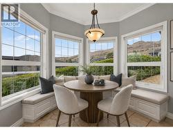 Kitchen nook virtually reimagined with built-in bench and decor. - 