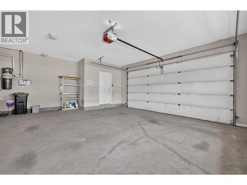 Large garage. - 7083 Jasper Drive, Vernon, BC - Indoor Photo Showing Garage