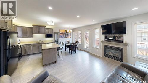 134 4100 Sandhill Crescent, Regina, SK - Indoor With Fireplace