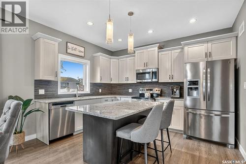 523 Redwood Crescent, Warman, SK - Indoor Photo Showing Kitchen With Stainless Steel Kitchen With Upgraded Kitchen
