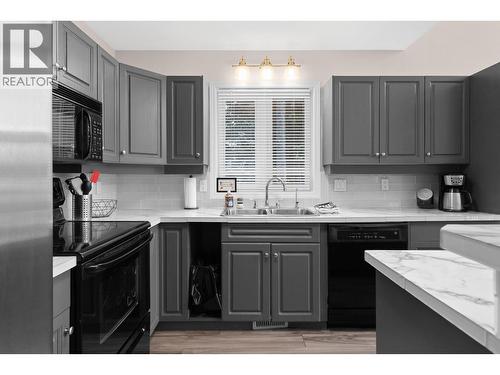 9315 Paradise Road, Kelowna, BC - Indoor Photo Showing Kitchen With Double Sink