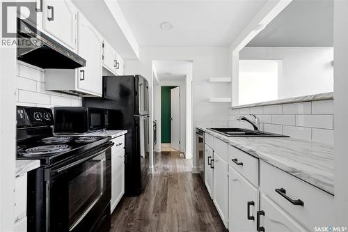 5136 10Th Avenue, Regina, SK - Indoor Photo Showing Kitchen With Double Sink