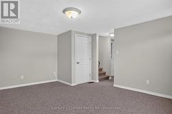 bedroom 4 / living room / flex space w/walkout - 