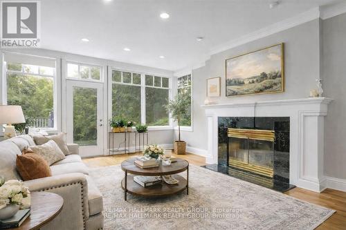 23 Davidson Drive, Ottawa, ON - Indoor Photo Showing Living Room With Fireplace