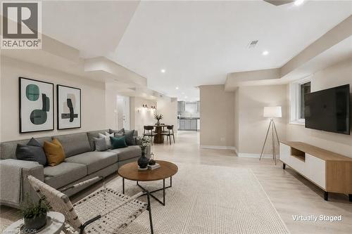 In-Law Suite Virtually Staged - 5 Manor Crescent, Grimsby, ON - Indoor Photo Showing Living Room