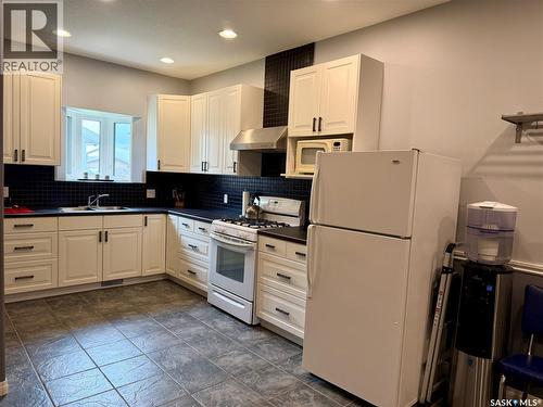 123 Chitek Drive, Chitek Lake, SK - Indoor Photo Showing Kitchen With Double Sink