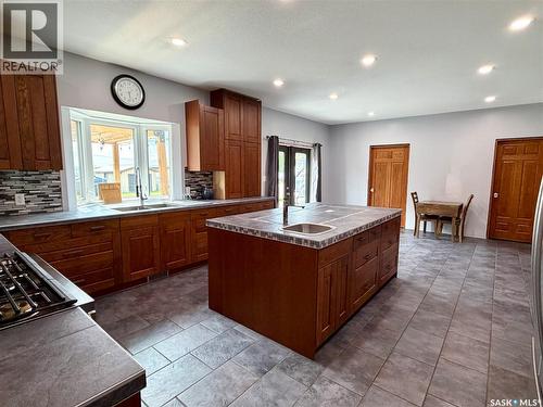 123 Chitek Drive, Chitek Lake, SK - Indoor Photo Showing Kitchen With Double Sink