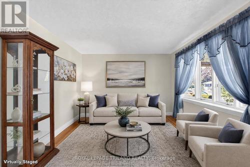 Virtually staged - 7 Thompson Avenue, St. Thomas, ON - Indoor Photo Showing Living Room