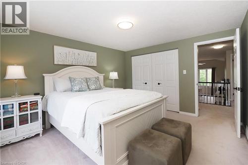 Interior room featuring a neutral carpet flooring and painted walls - 218 Inverhuron Crescent Unit# A, Waterloo, ON - Indoor Photo Showing Bedroom