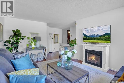 1385 Queen Crescent, Moose Jaw, SK - Indoor Photo Showing Living Room With Fireplace