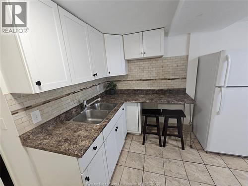1143 Langlois, Windsor, ON - Indoor Photo Showing Kitchen With Double Sink