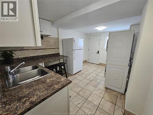 1143 Langlois, Windsor, ON - Indoor Photo Showing Kitchen With Double Sink