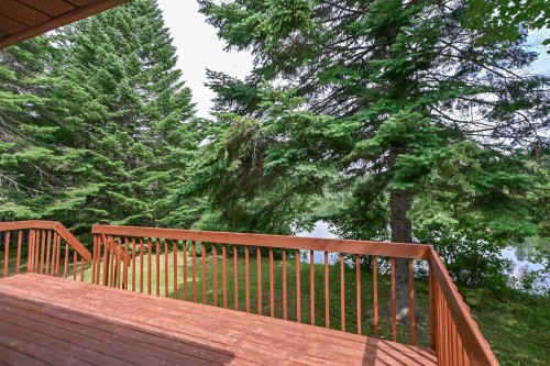 Vue sur l'eau - 16 Ch. Du Lac-Adair, Saint-Hippolyte, QC - Outdoor With Deck Patio Veranda