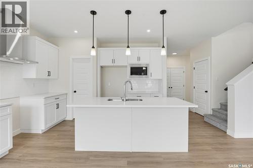 692 Nazarali Lane, Saskatoon, SK - Indoor Photo Showing Kitchen With Upgraded Kitchen