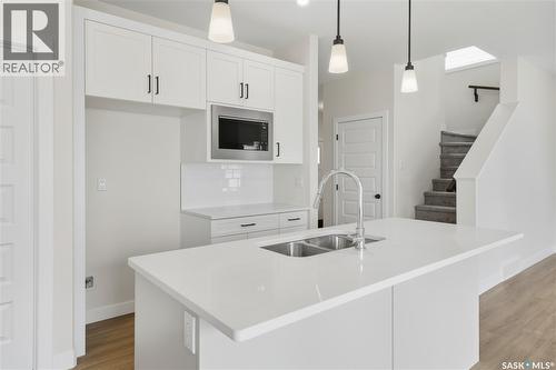 692 Nazarali Lane, Saskatoon, SK - Indoor Photo Showing Kitchen With Double Sink With Upgraded Kitchen
