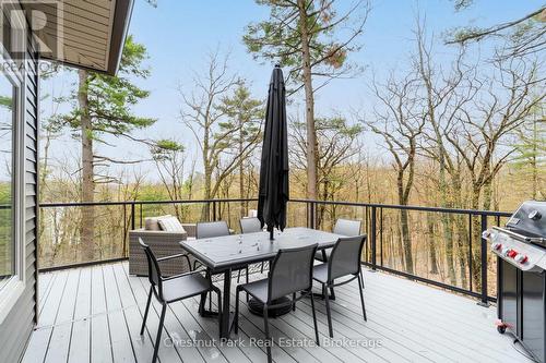 Deck overlooking Silver Lake - 30 Stephen Road, Muskoka Lakes (Medora), ON - Outdoor With Deck Patio Veranda With Exterior