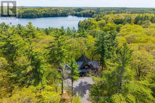 Fabulous privacy and partial views of Silver Lake - 30 Stephen Road, Muskoka Lakes (Medora), ON - Outdoor With Body Of Water With View