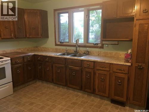 836 Peters Avenue, Oxbow, SK - Indoor Photo Showing Kitchen With Double Sink
