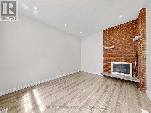 148 Sexton Crescent, Toronto, ON - Indoor Photo Showing Other Room With Fireplace